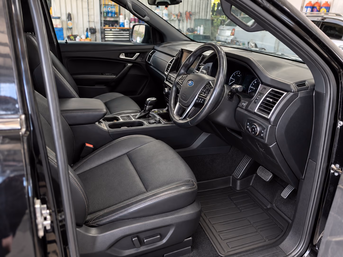 The same car interior area after deep cleaning and extraction