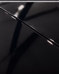 Close-up of a light reflection in freshly corrected car paint